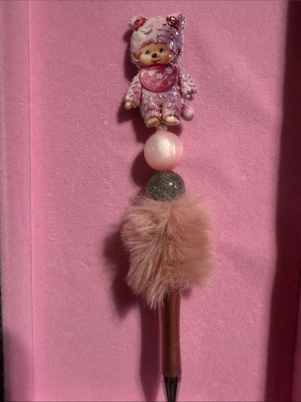Pink beaded fluffy Monchichi pen.